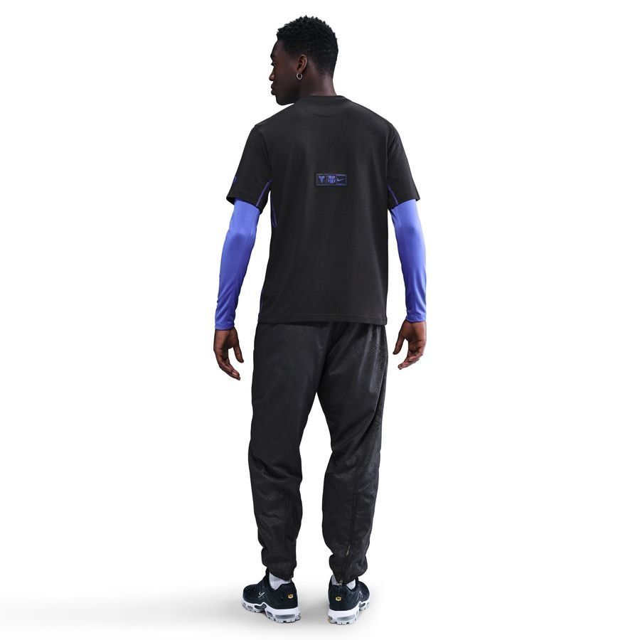 T-Shirt Barcelona Dri-FIT Primary Alternativa – Preto/Violeta - Versão Adepto