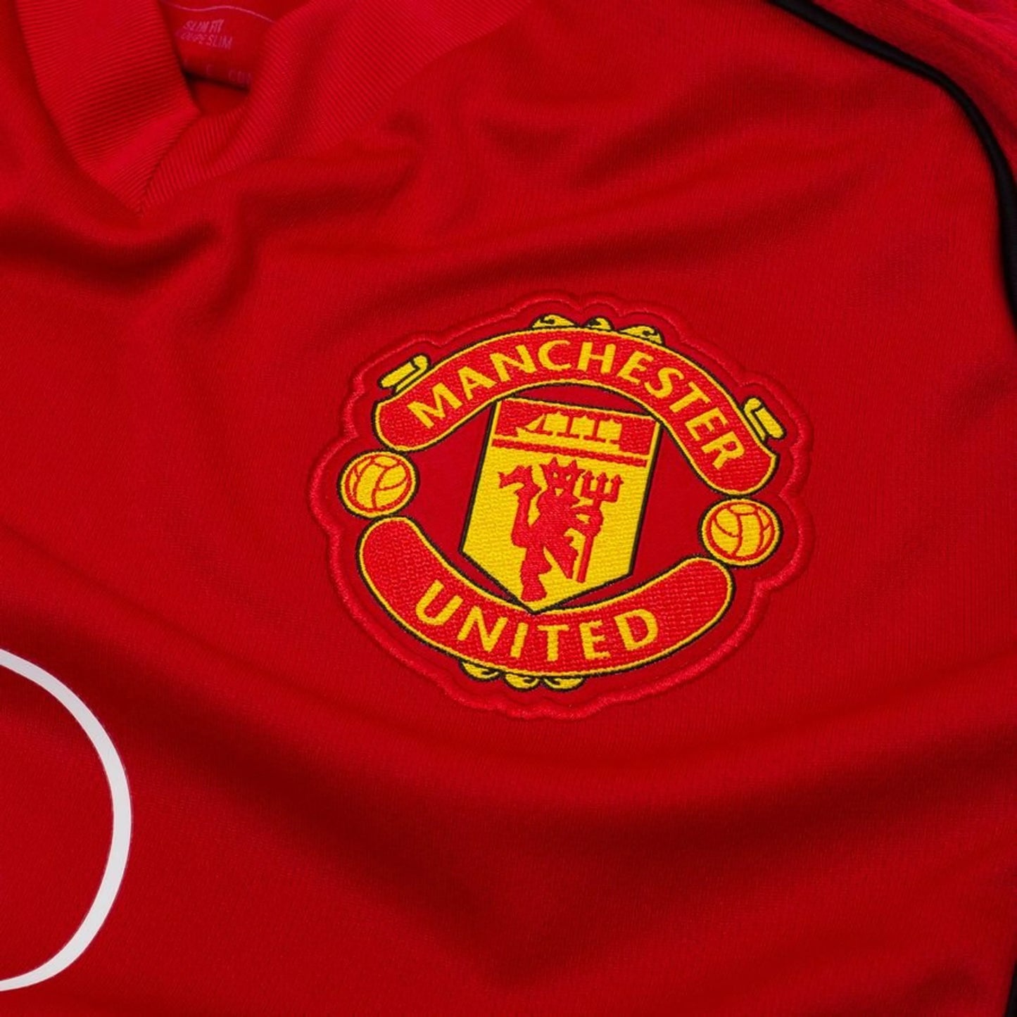 Camisola Manchester United Principal 2025/26- Versão Adepto